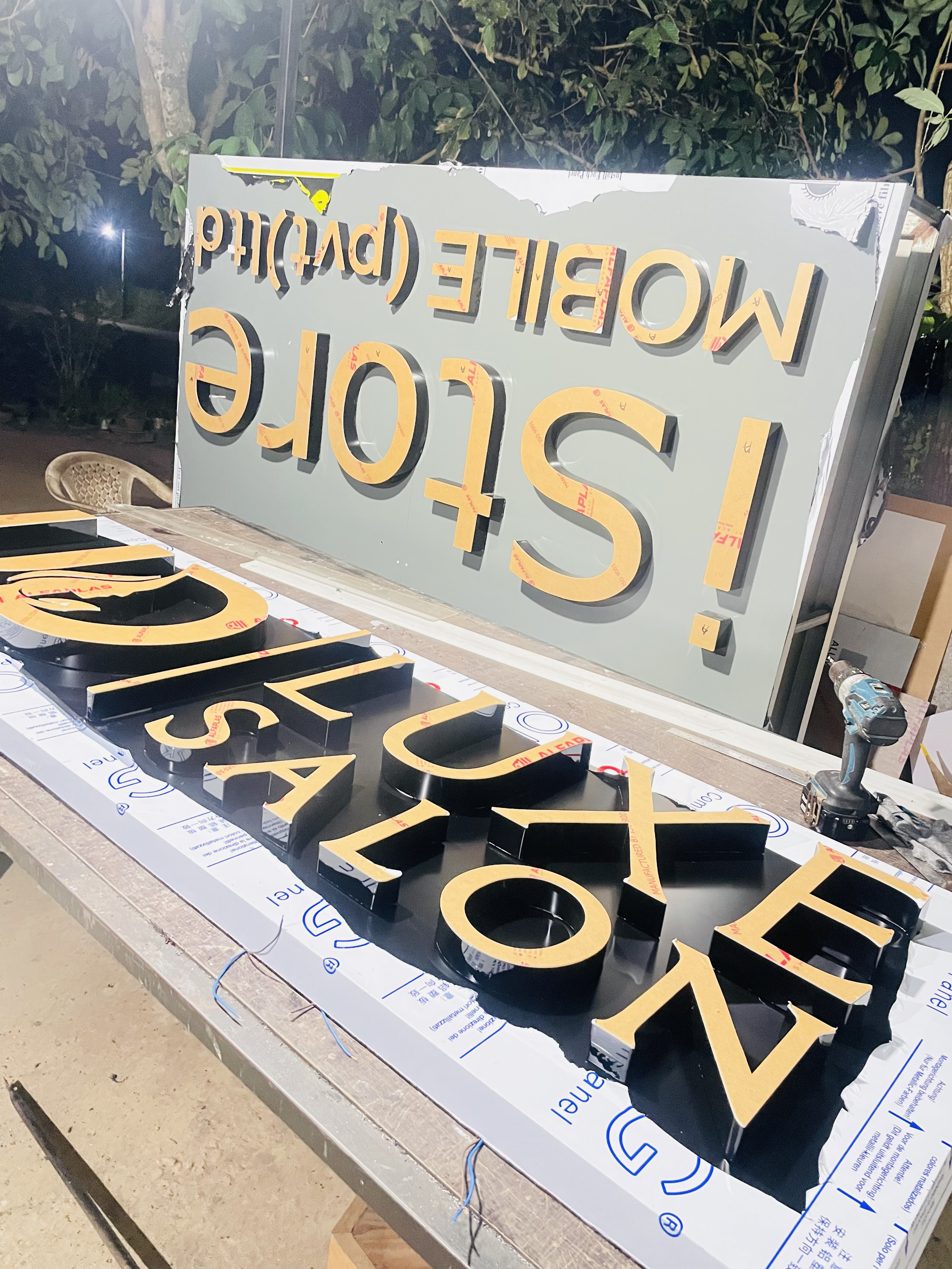 Close-up of custom three-dimensional lettering in the Siyasro workshop